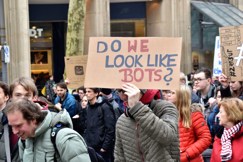 Bots sign at Protest