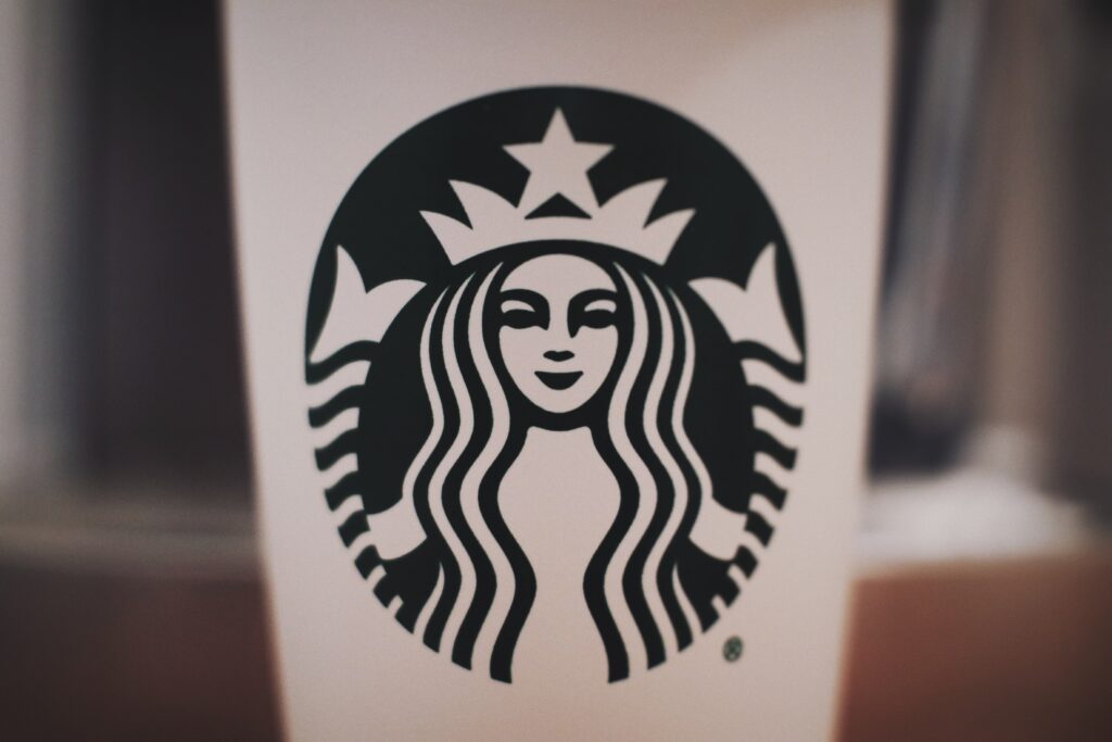 markenkern brand essence starbucks logo on coffee cup